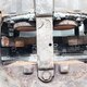 Суппорт тормозной передний левый  б/у 21487603/68324882 для Volvo (Вольво) MERITOR - 1