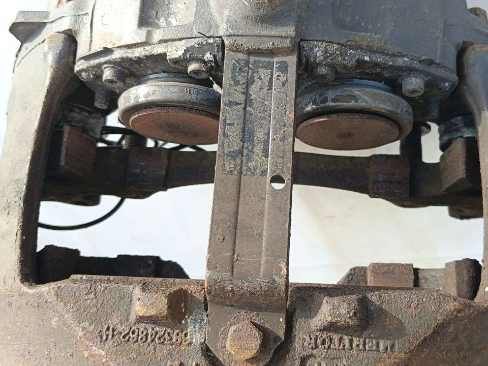 Суппорт тормозной задний левый   б/у 21487595 / 68324857 для Volvo (Вольво) - 1